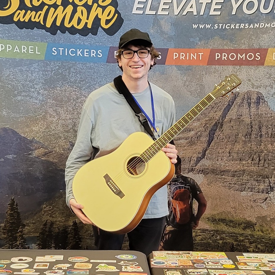 Congrats to Tyler from Portage Lake Bible Camp on winning the guitar at the Christian Camp and Conference Association  Michigan Conference. We love seeing all the happy faces at our booths. Need to take your brand up a notch? Check out our website and see how you can elevated your brand with some awesome merch. 
https://stickersandmore.com/camp/
#CCCA #guitar #camp #churchcamp #camplife #winnerswin